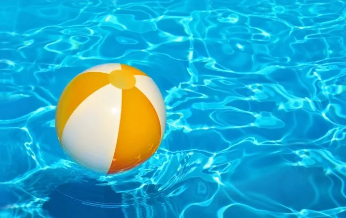 Beach ball in a pool